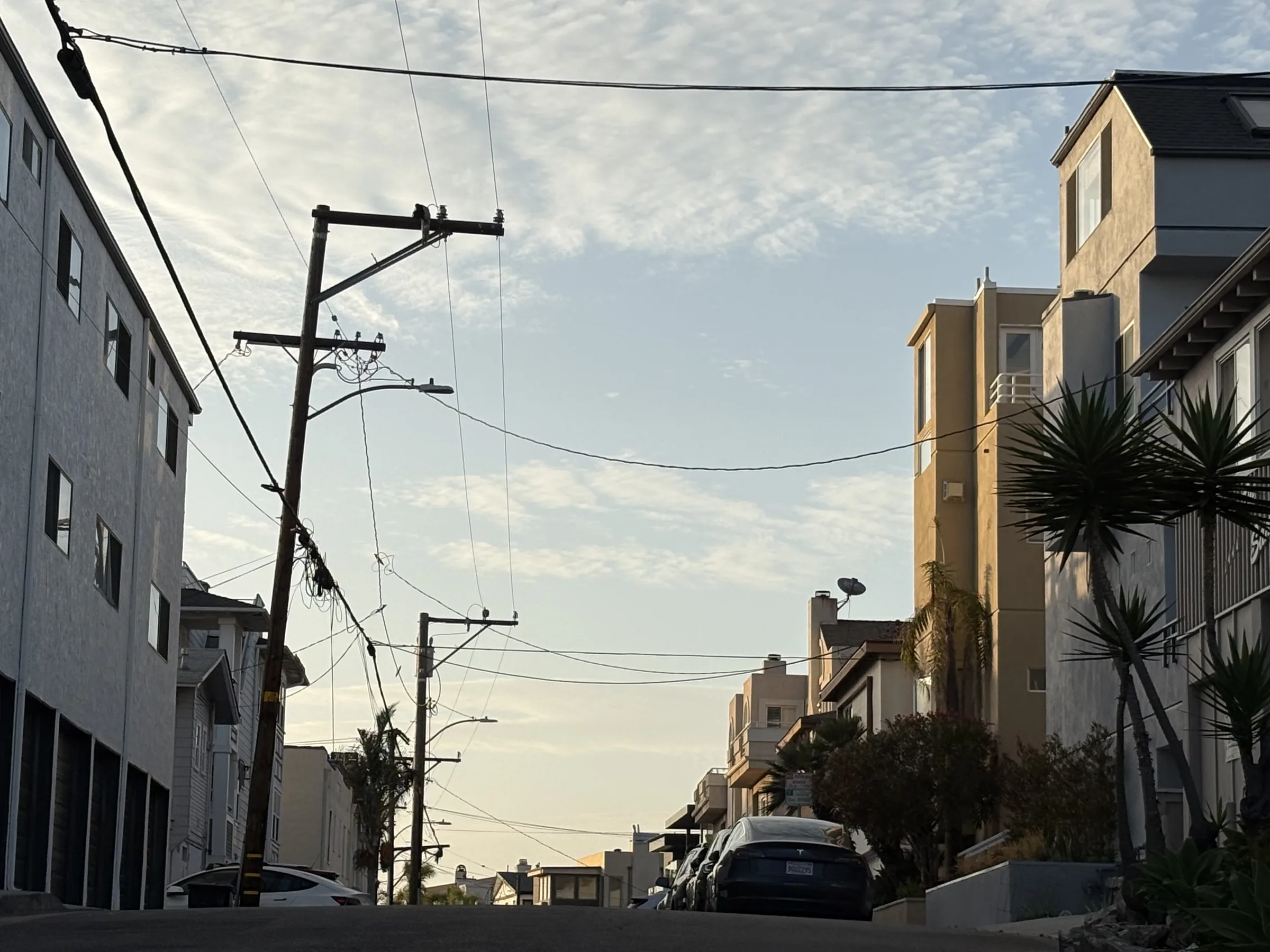 Hillside residences catching warm evening light in Hermosa Beach