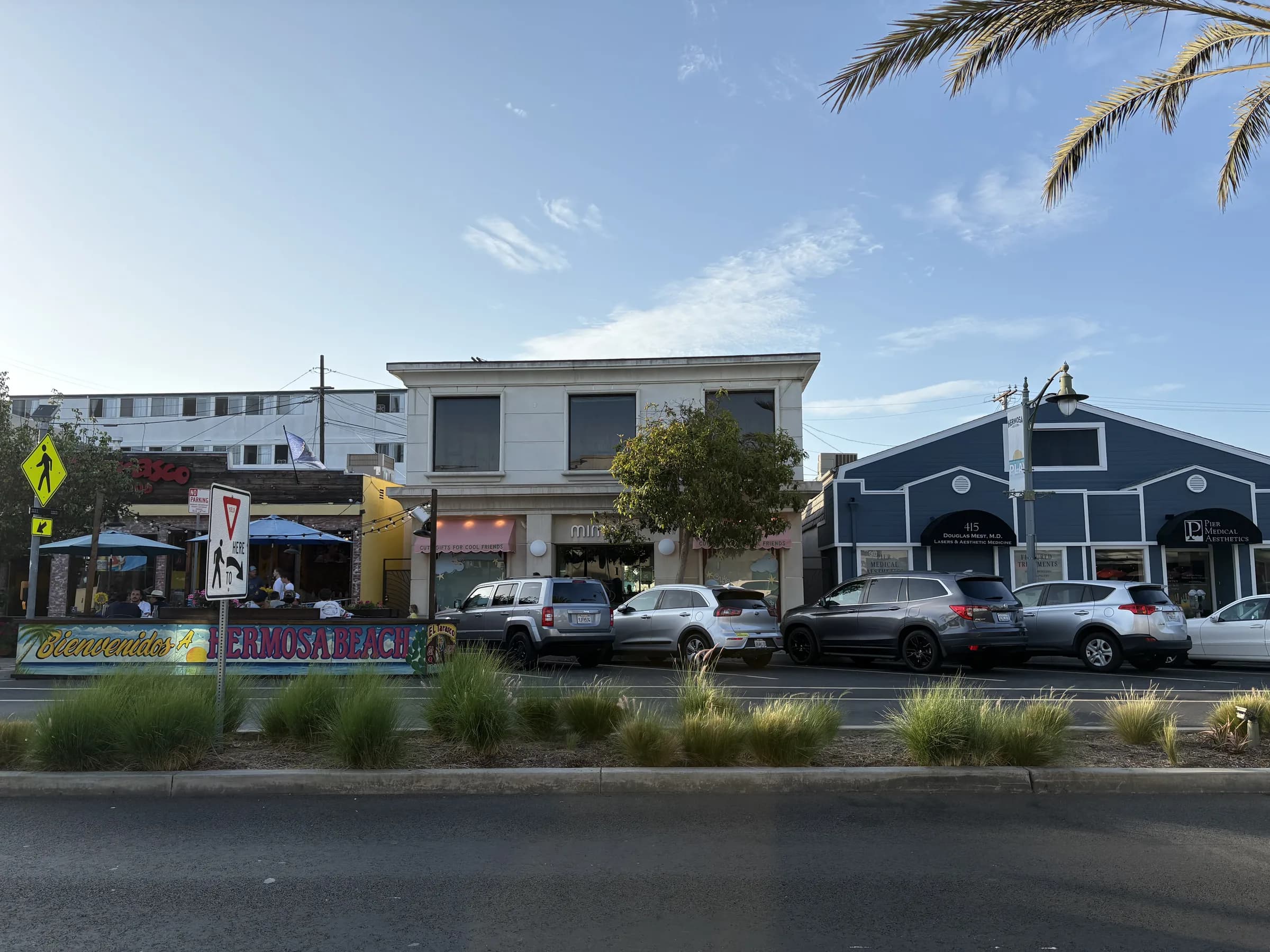 A neighborhood cafe and gathering place along a Hermosa Beach street