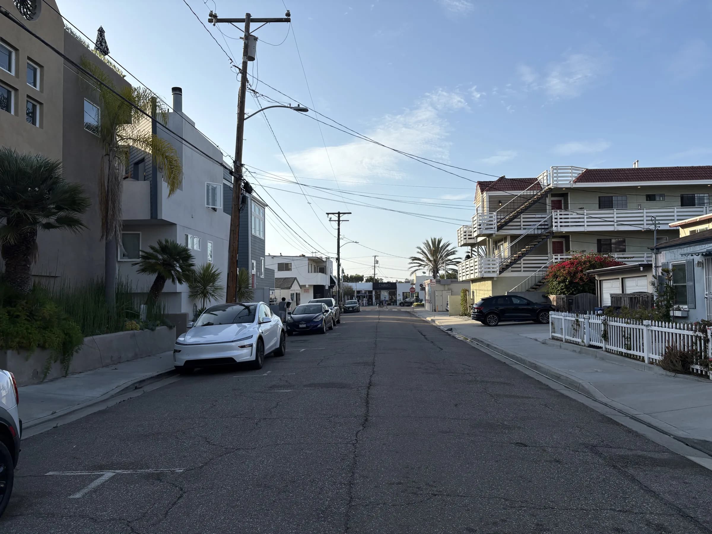 An intimate residential lane lined with a mix of Hermosa Beach homes