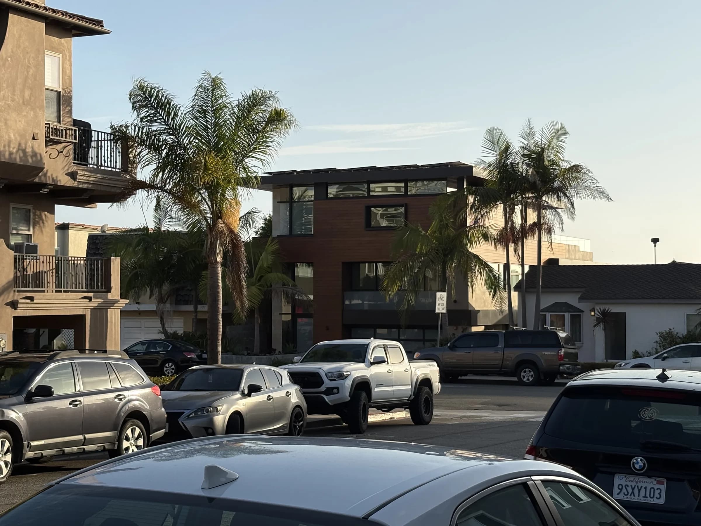 Low-rise apartments and palms in a Hermosa Beach residential area