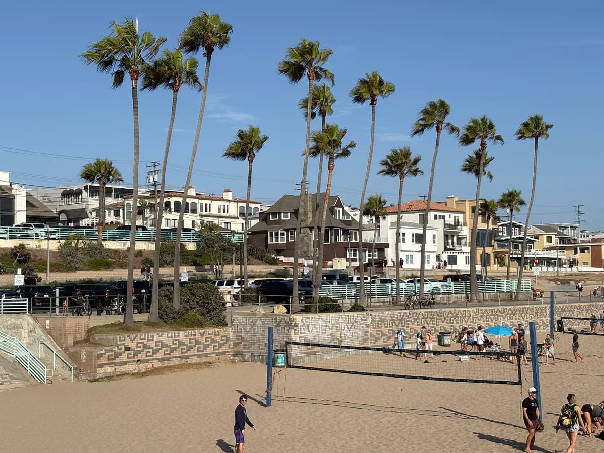Beachfront homes and volleyball courts in Manhattan Beach