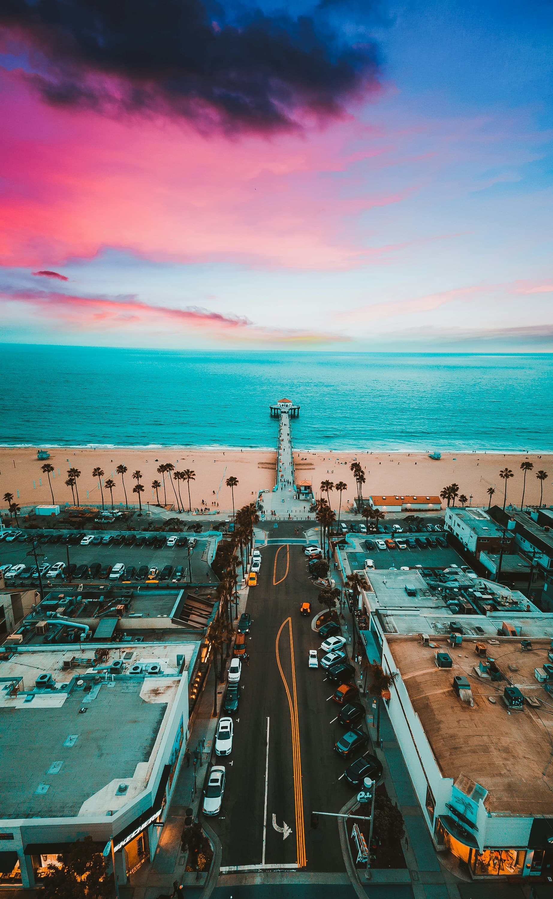 Aerial view down Manhattan Beach Boulevard to the pier at sunset