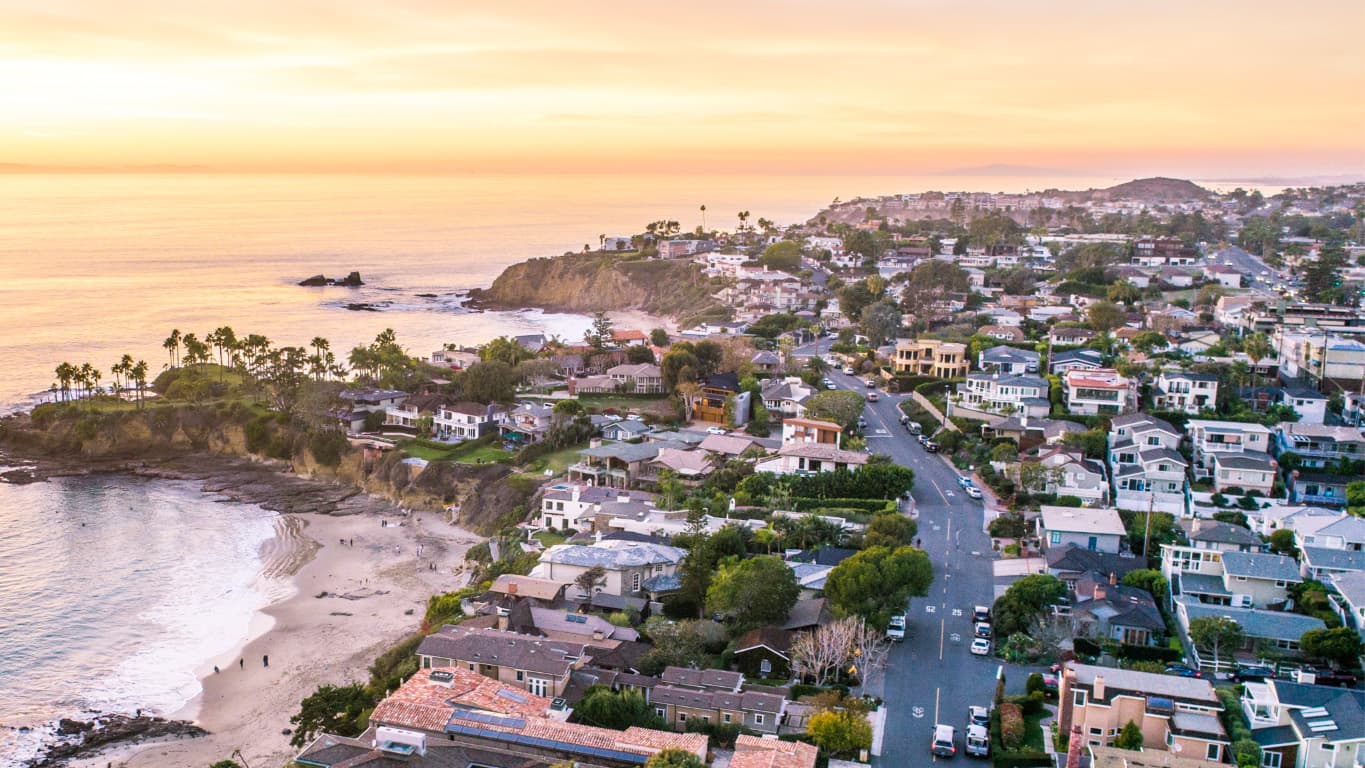 Coastal homes and a small cove in the Palos Verdes community at sunset