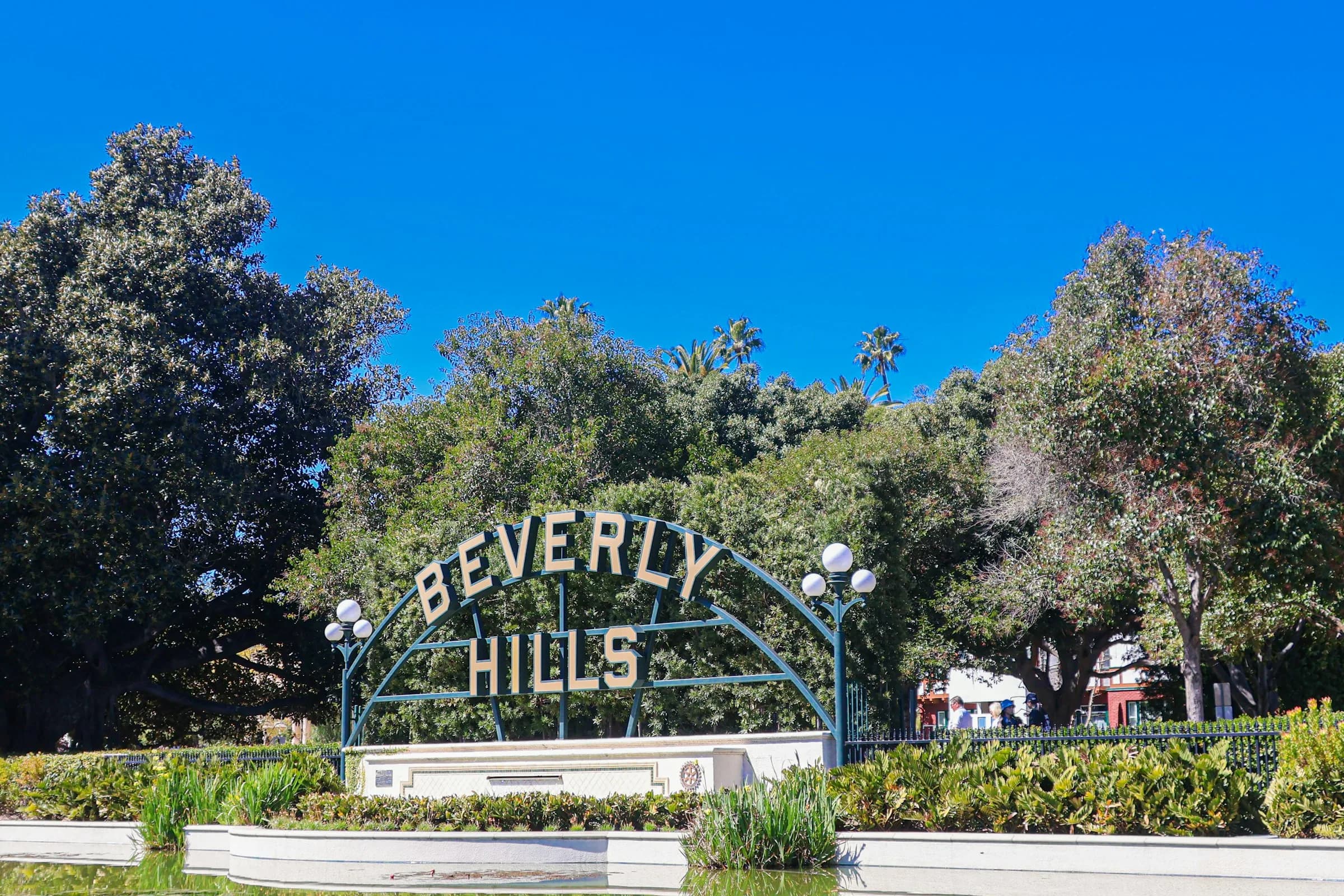 The Beverly Hills sign and lily pond in Beverly Gardens Park