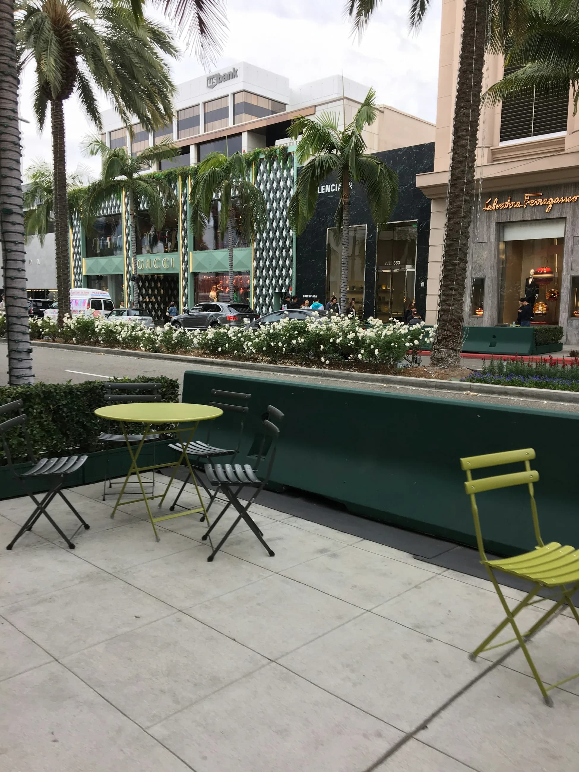 Outdoor cafe seating overlooking Rodeo Drive