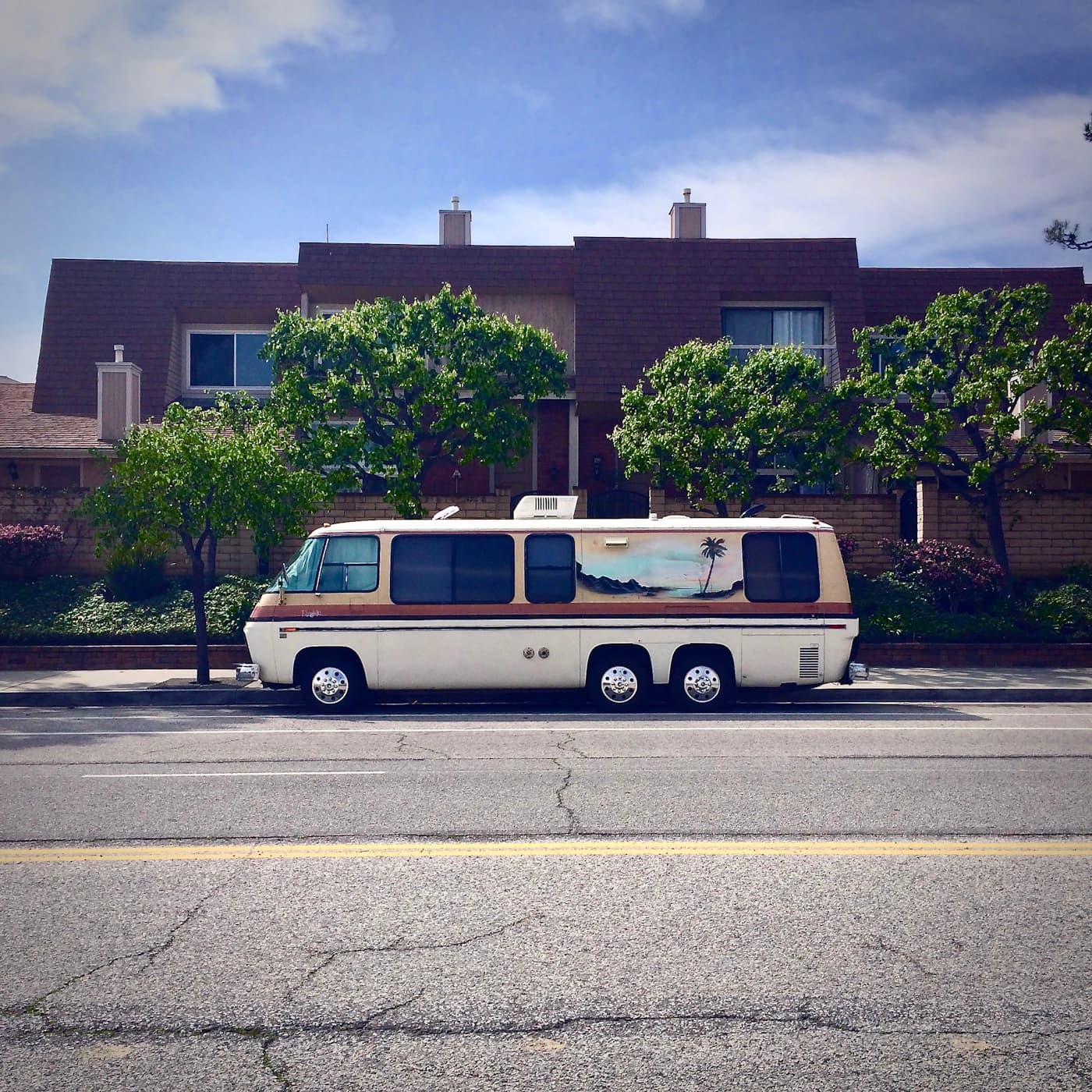 A distinctive Marina del Rey townhome street with a parked vintage van
