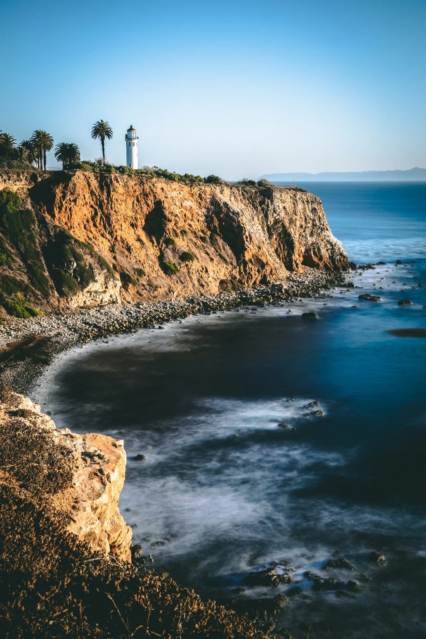 Palms and cliffs surrounding a secluded Palos Verdes inlet