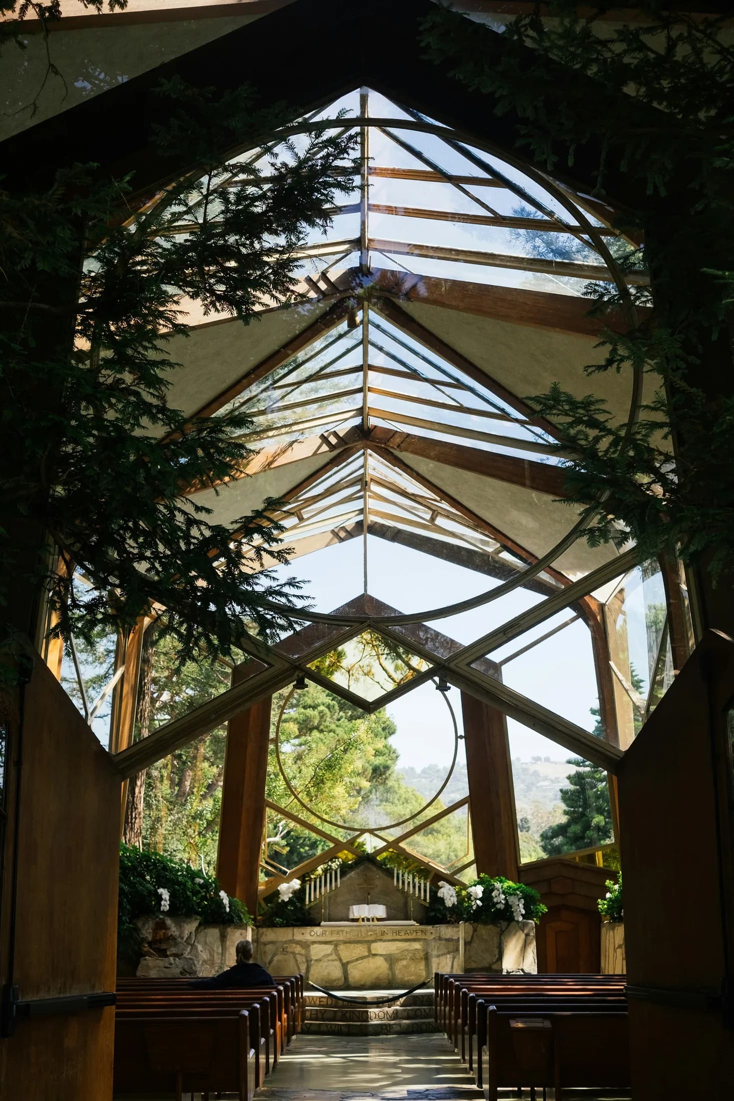 The glass-and-wood interior of Wayfarers Chapel