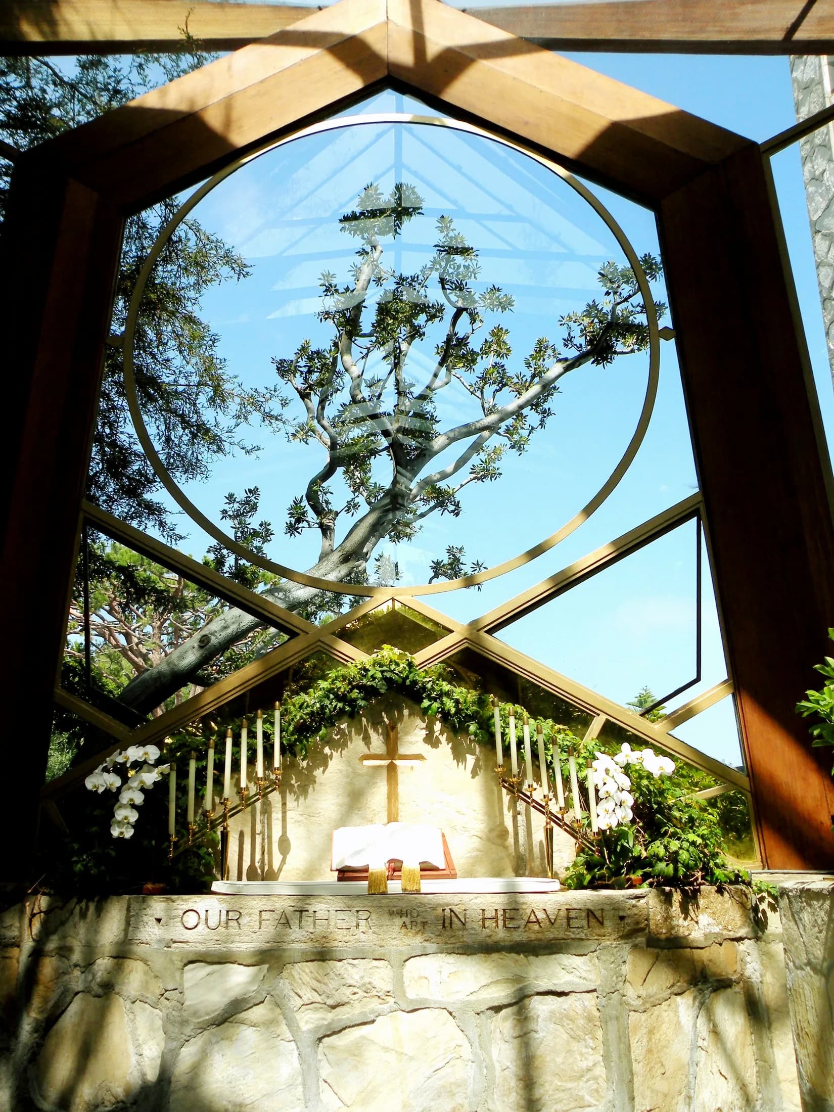 Wayfarers Chapel seen through its glass entry and surrounding trees