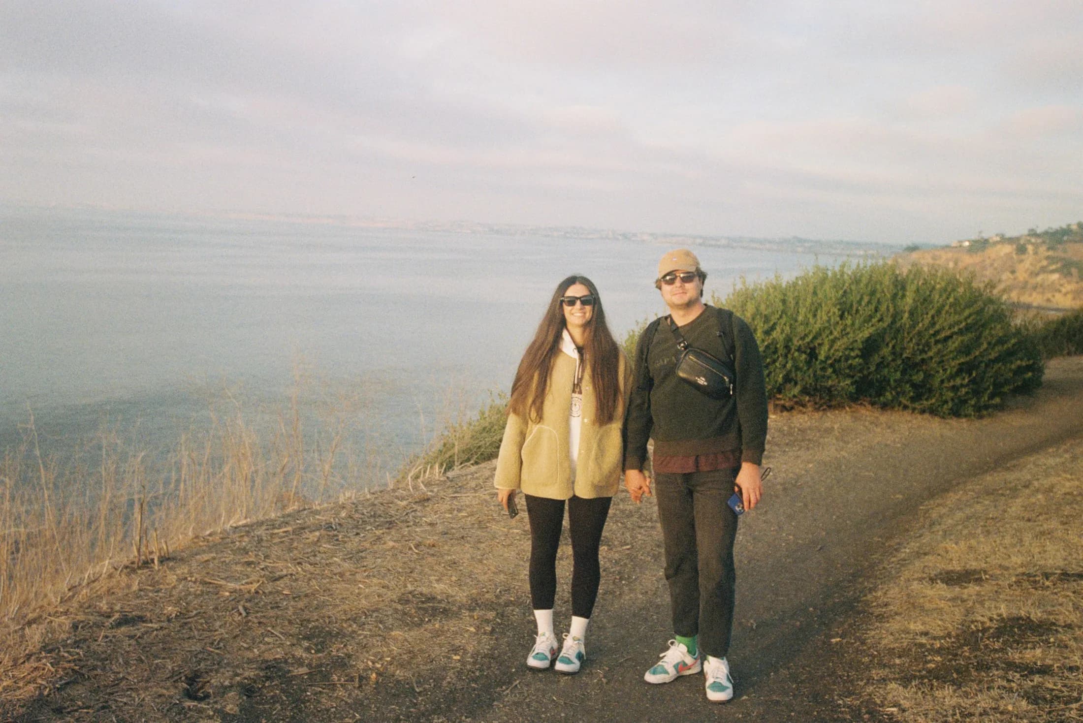 A couple walking together along a Palos Verdes coastal path