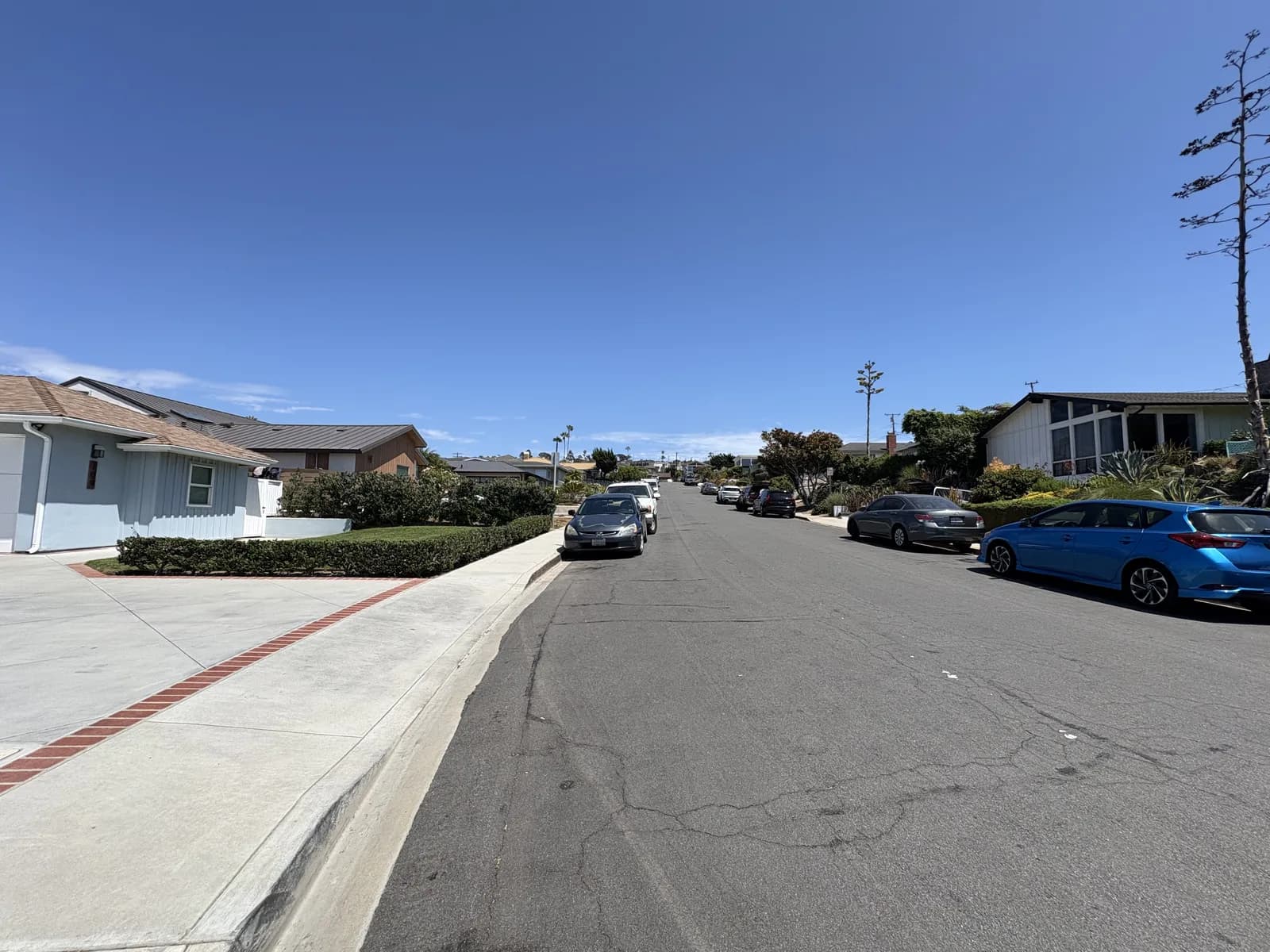 Quiet Redondo Beach residential street with low-rise coastal homes