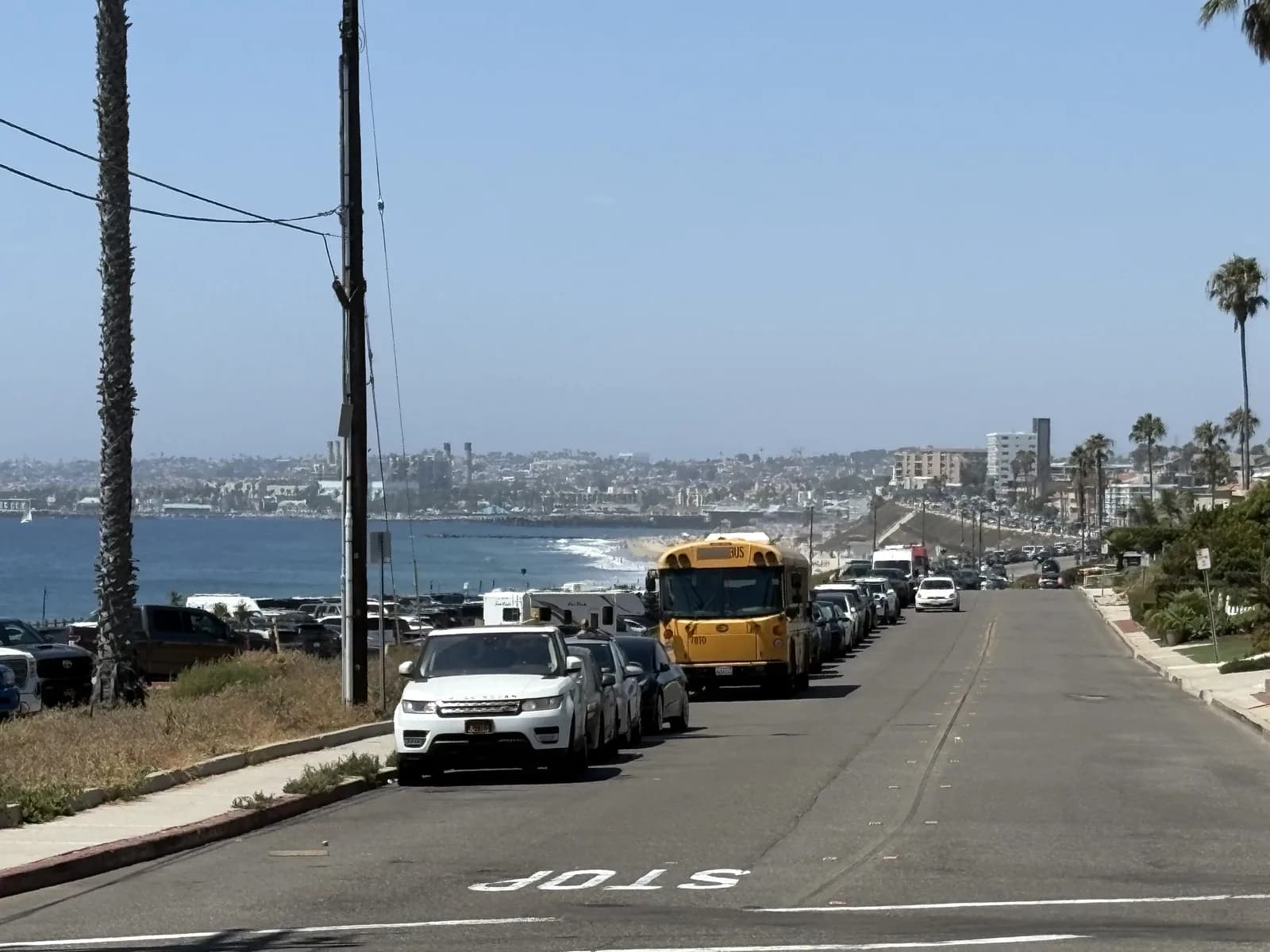 Residential street descending toward King Harbor and the coastline