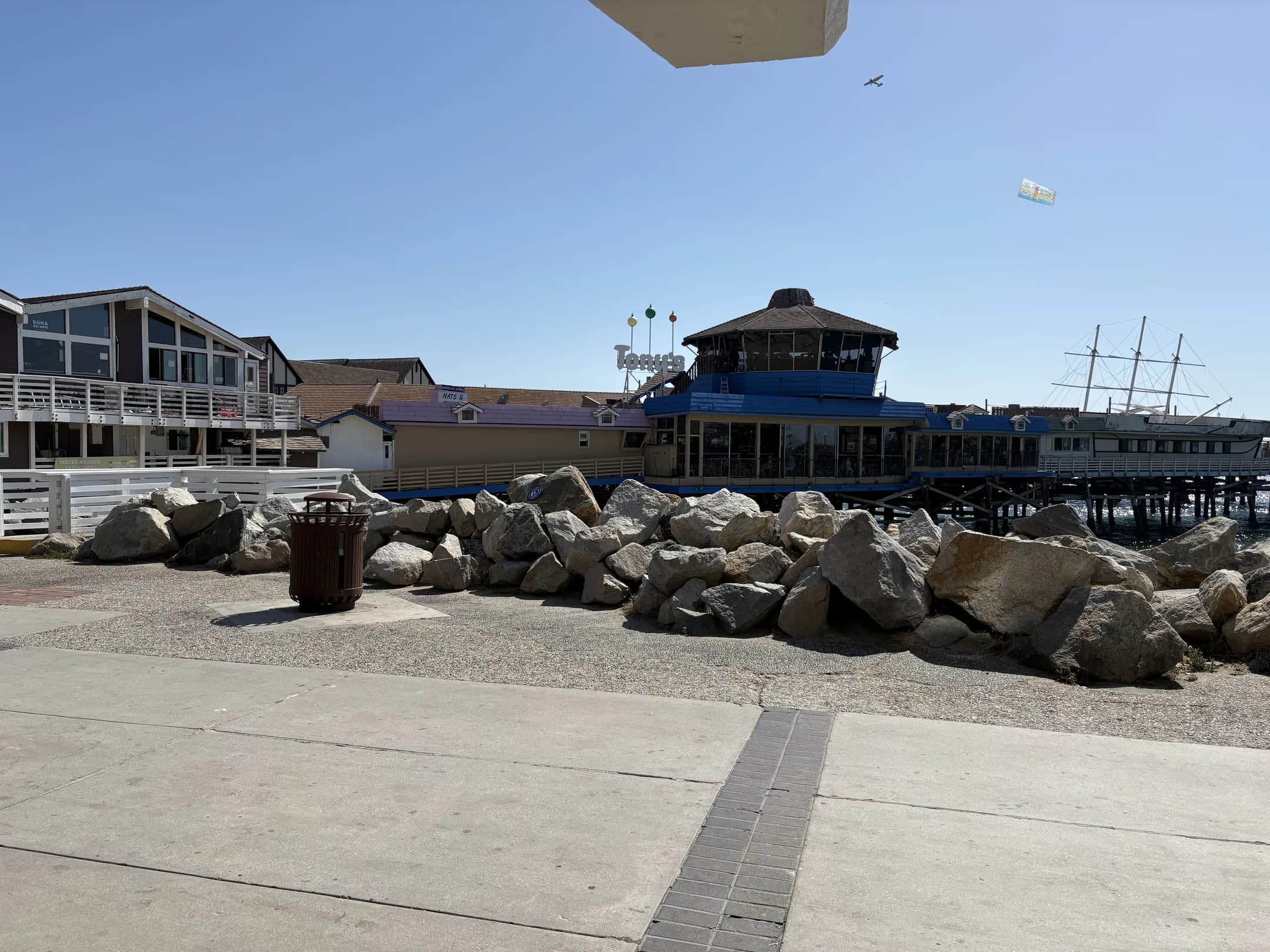 Redondo Beach Pier viewed across the shoreline rocks