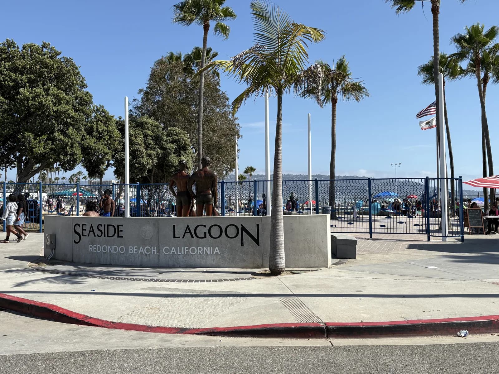 Palm-framed entrance to Seaside Lagoon in Redondo Beach