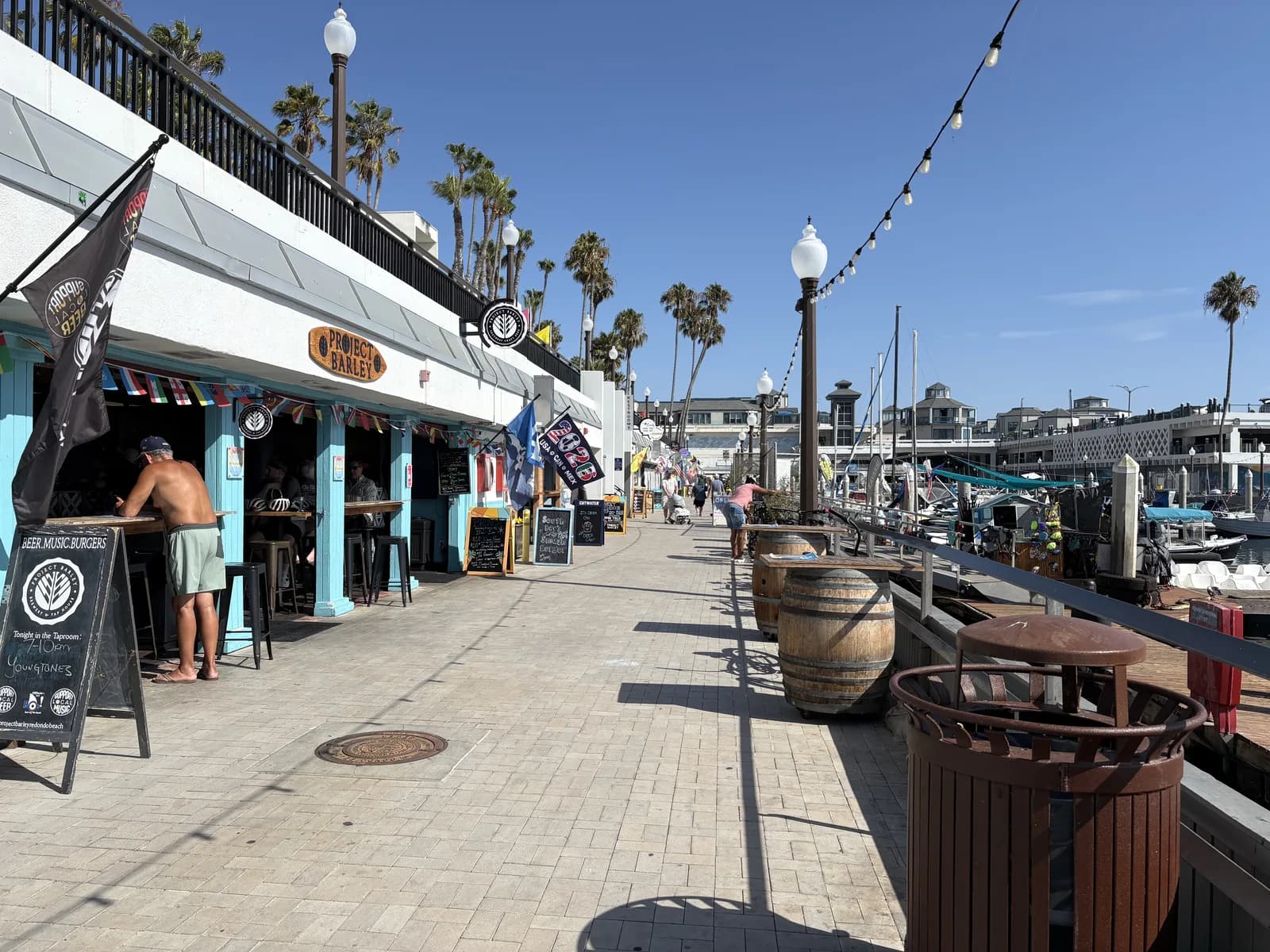 Waterfront restaurants and pedestrian promenade at King Harbor
