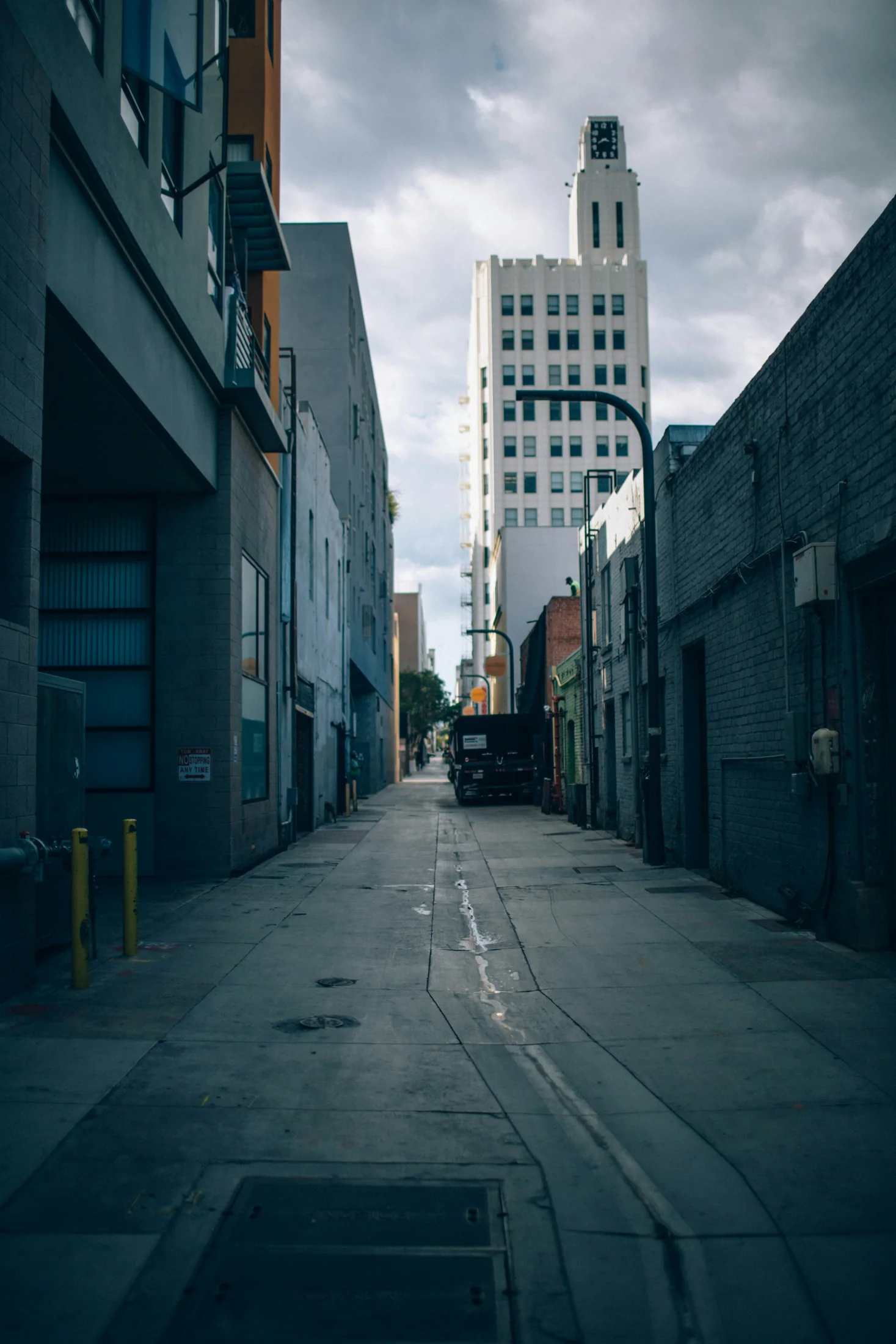 A narrow service lane between downtown Santa Monica buildings