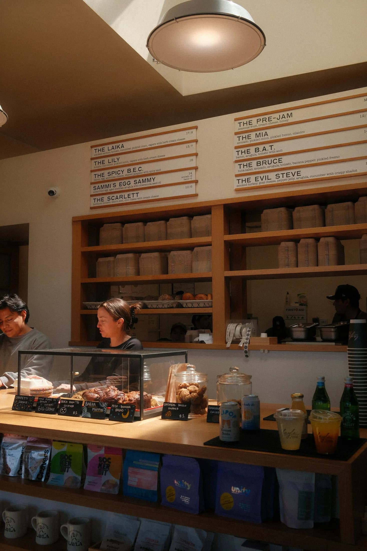 Customers and staff inside a welcoming Santa Monica neighborhood cafe