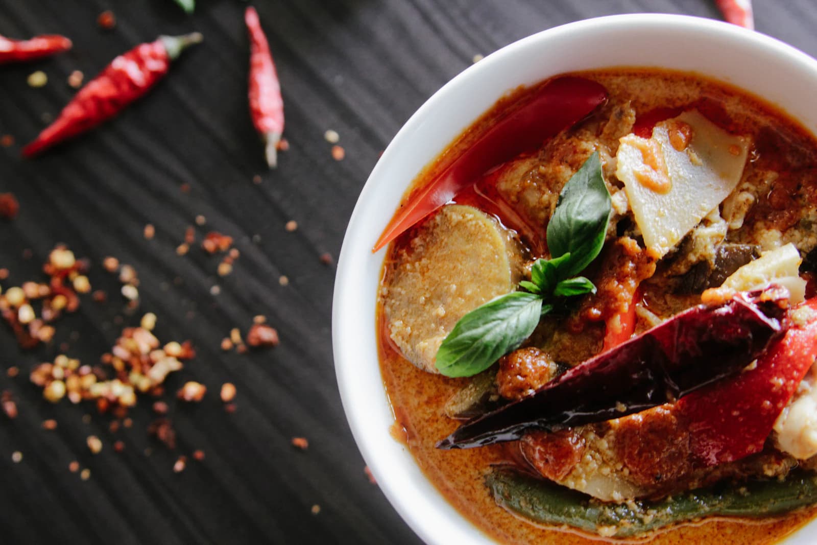 Thai red curry served with basil and chiles