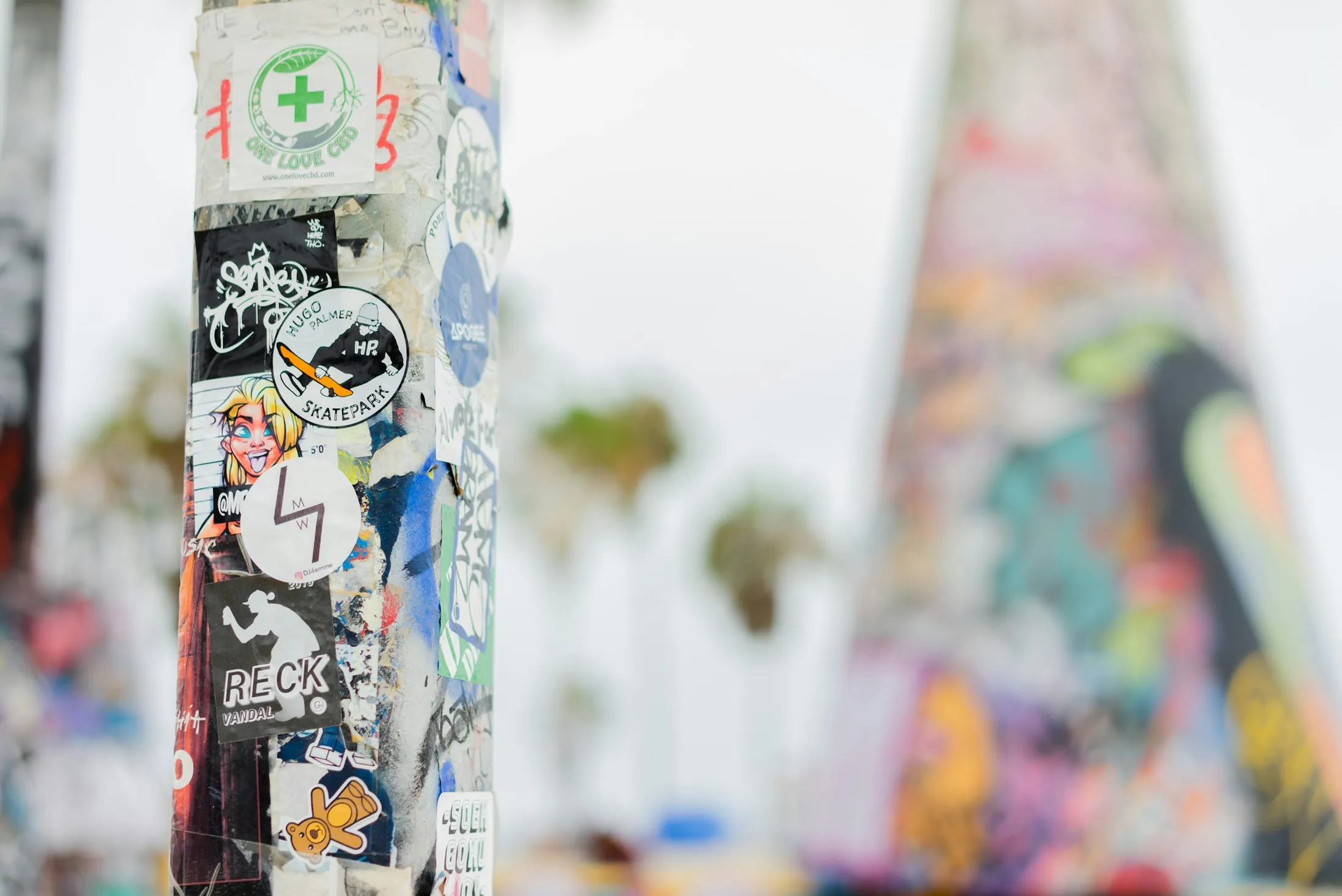Colorful surfboards and street-art details along the Venice boardwalk