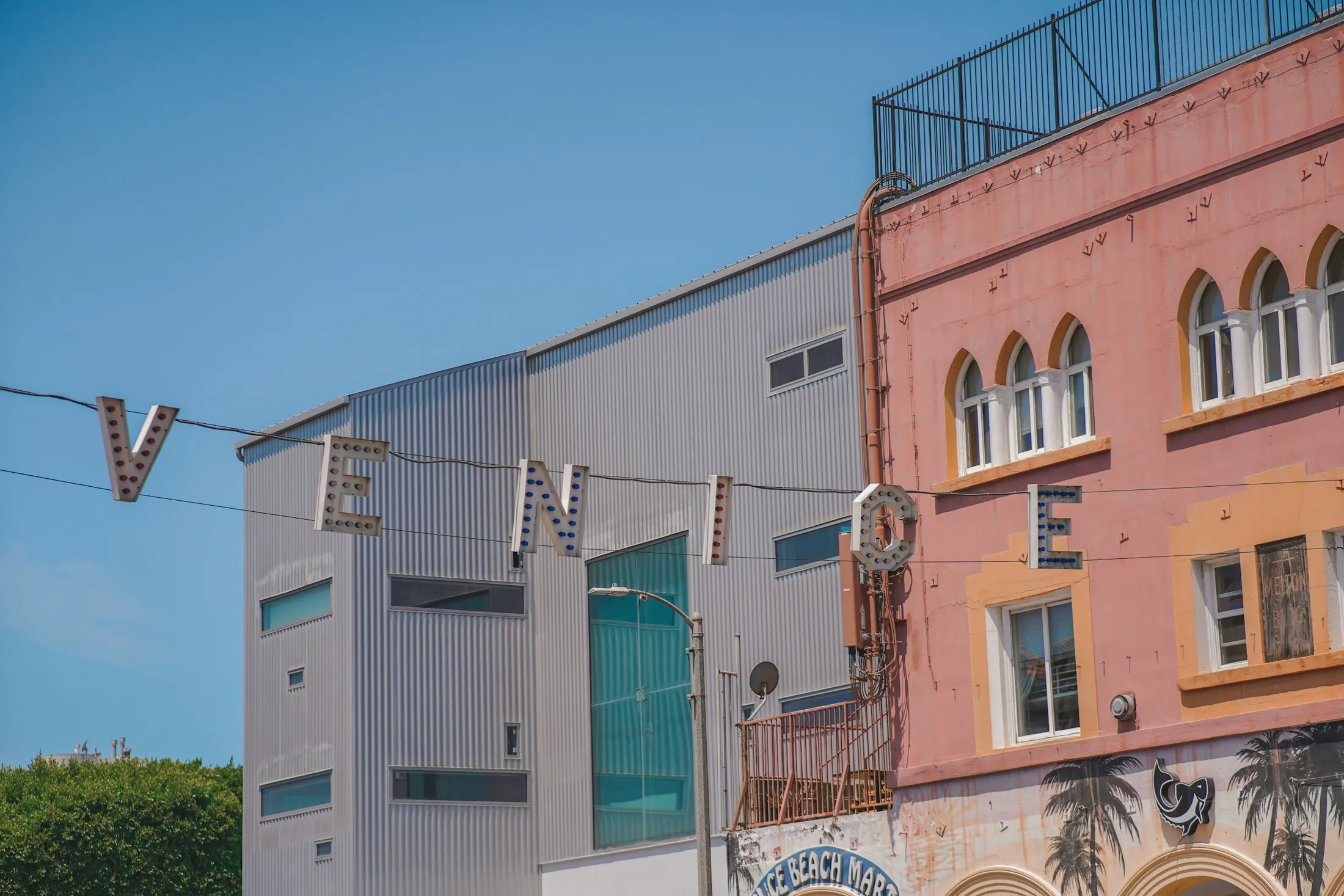 The colorful arcade buildings that frame Windward Avenue in Venice