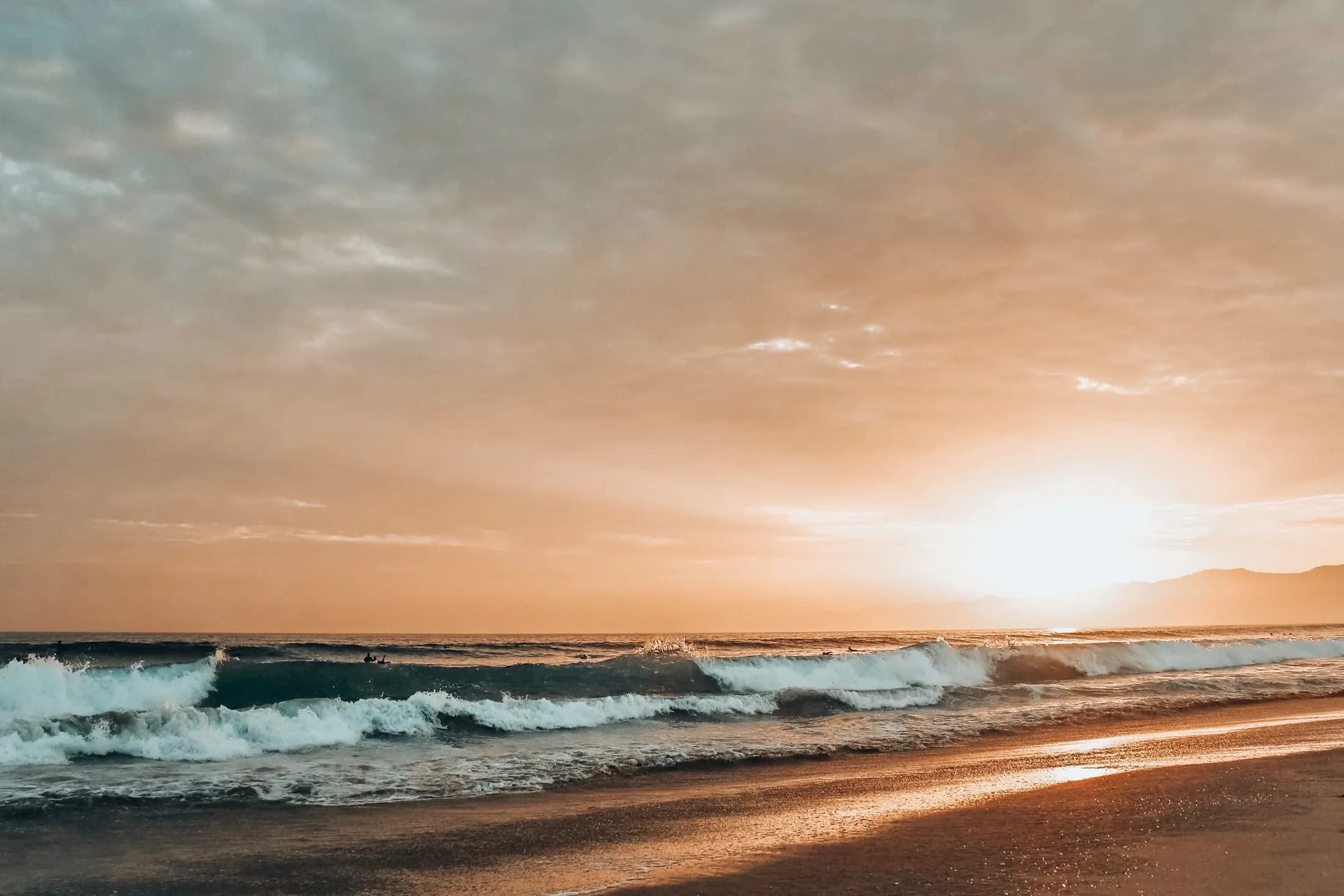 A warm sunset settling over the water at Venice Beach