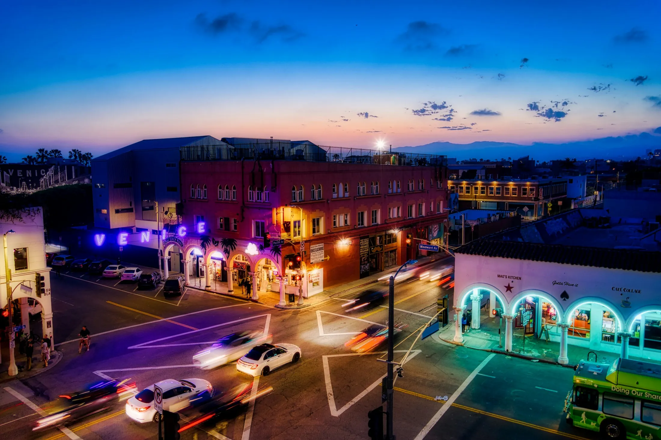 Windward Avenue and its crosswalk glowing at the edge of evening