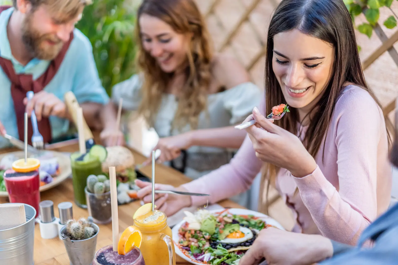 Friends sharing a meal at a neighborhood restaurant