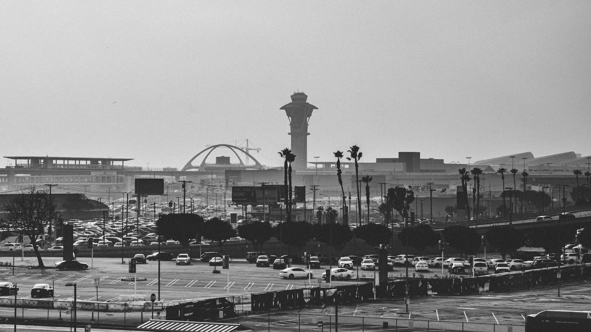 Black-and-white view of the LAX terminal and control tower